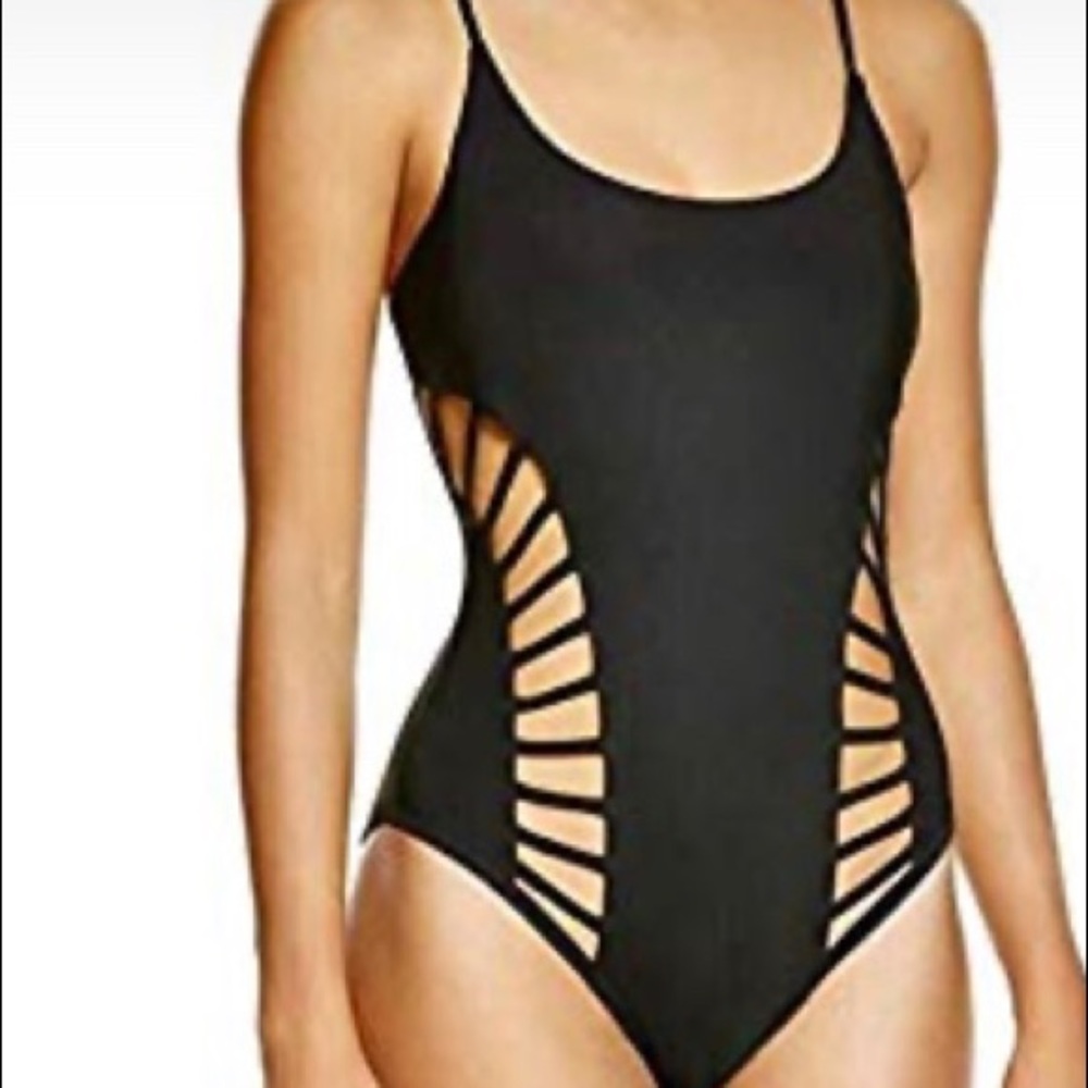 One piece bathing suit Brand new with liner tags.